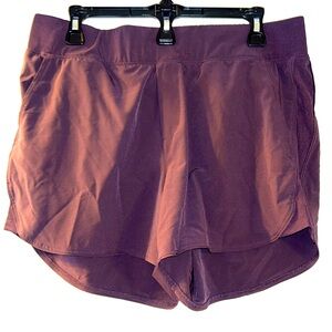 Purple women’s athletic shorts, XL, with pockets on sides, zipper pocket on back